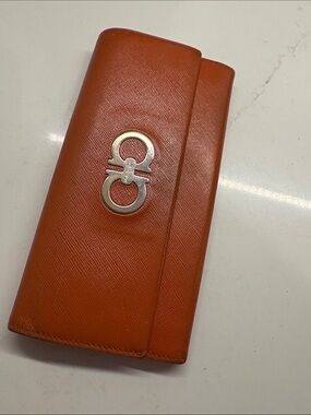 Salvatore Ferragamo Burnt Orange Leather Continental Wallet with Silver Gancini